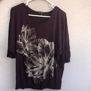 Mid sleeved, long purple women’s top
